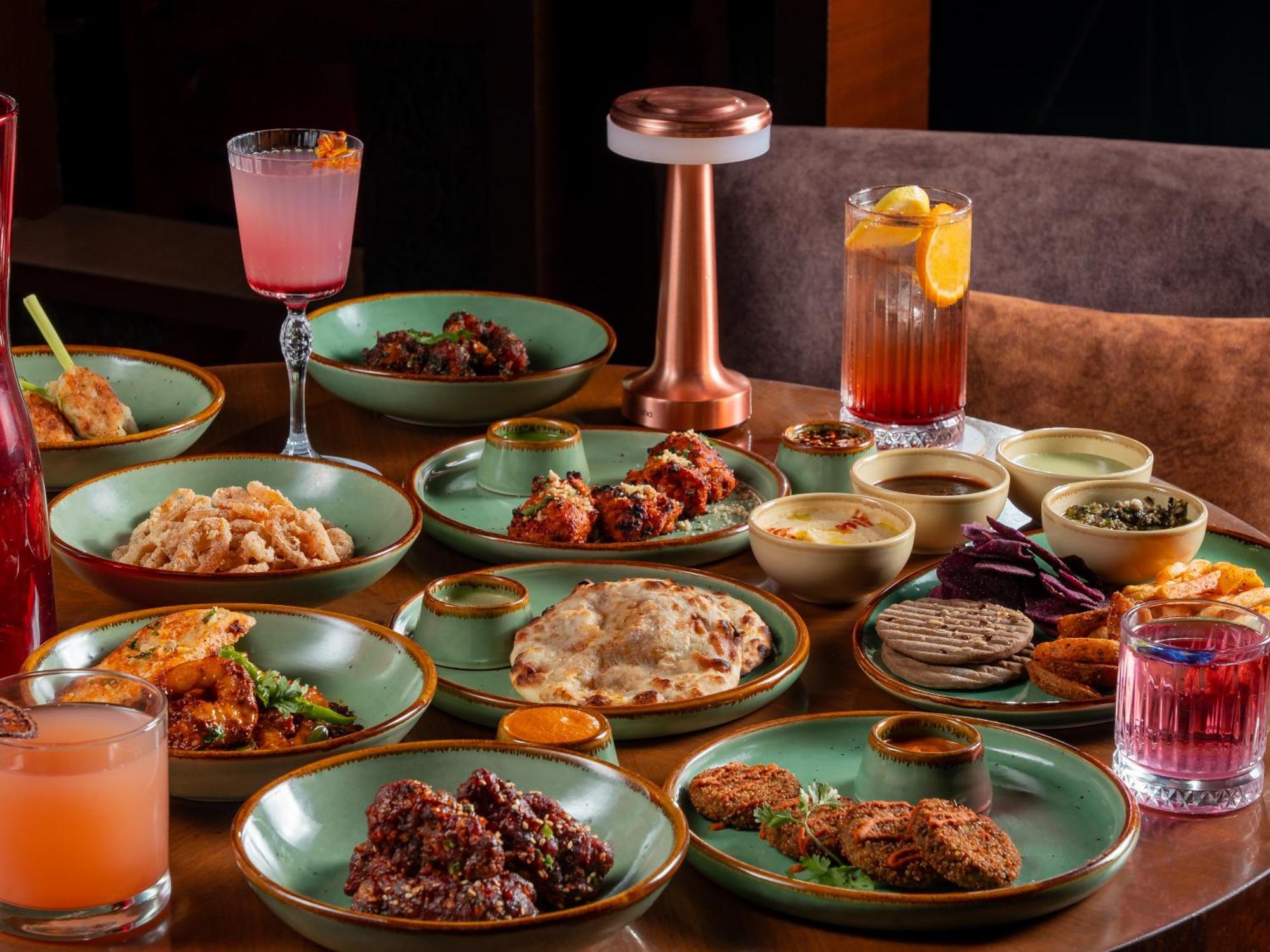فندق حياة بيون بونة المظهر الخارجي الصورة A selection of small plates at a restaurant in Mumbai, India